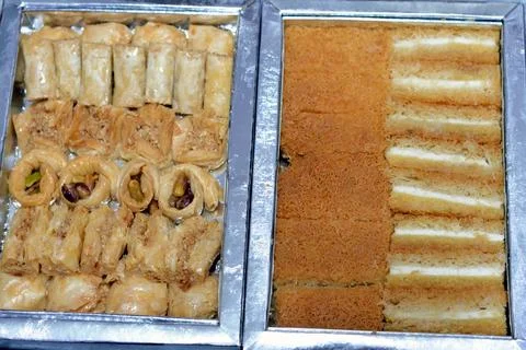 Eastern sweets of different types of Baklava of different shapes covered an.. Stock Photos