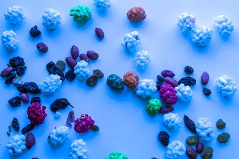Eastern sweets on a white background. Sweets, raisins, nuts. Stock Photos