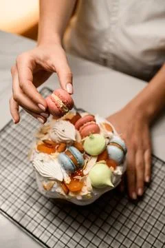 Easters top adorned with an array of colorful macarons Stock-Fotos