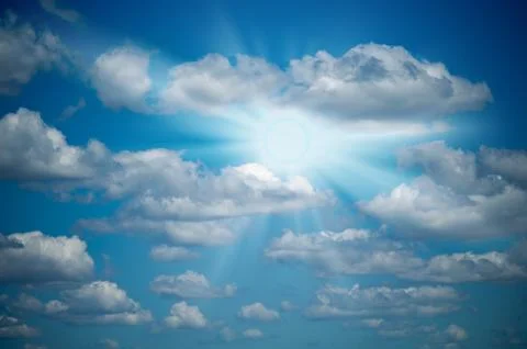 Easy clouds and the sun in the sky. Stock Photos
