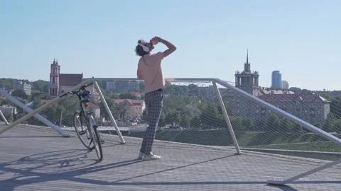 Easy-going dreamer resting and enjoying the city view Stock Footage 132888281
