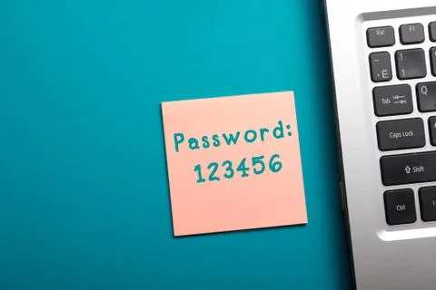 Easy Password Concept. Office table top view - Laptop and reminder 库存照片