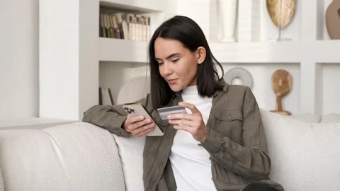 Easy pay using smart phone or digital device. Woman shopping online 4K Video stock 181879180