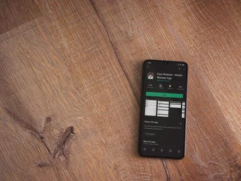 Easy Release Pro - Model Release app play store page on the display of a blac Stock Photos