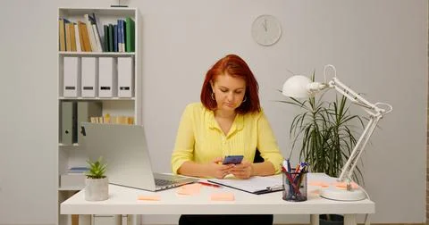 Easy technology access female calling her overseas client. Stock Photos