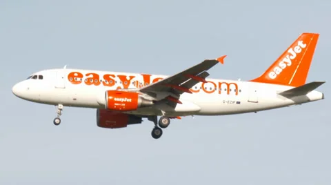 Easyjet airplane flying by Stock Footage 37537182