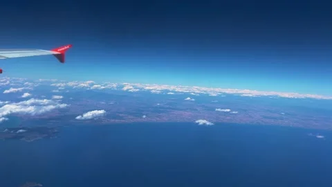 Easyjet airplane wing over argentario and giannutri island Stock Footage 280714476