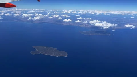 Easyjet airplane wing over elba, isola del giglio, giannutri Stock Footage 280714572