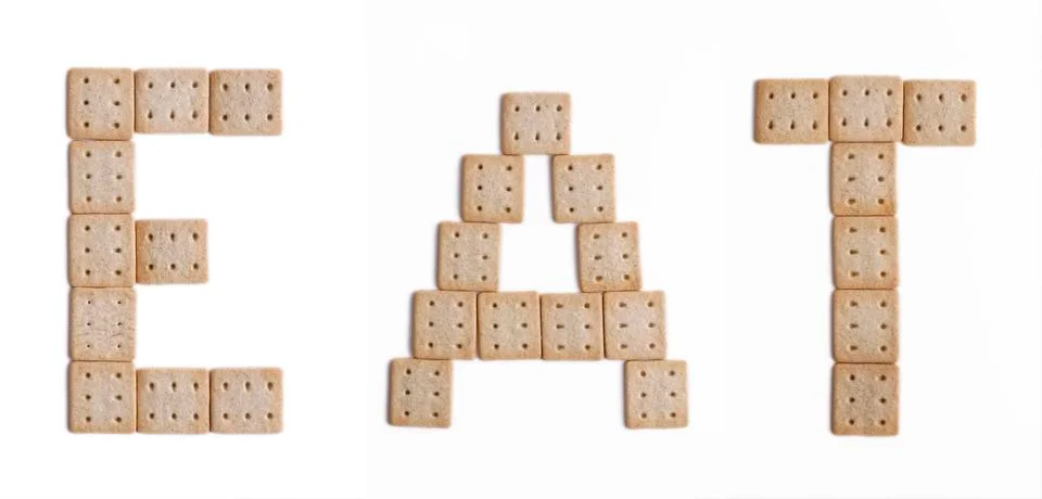 Eat biscuits Stock Photos