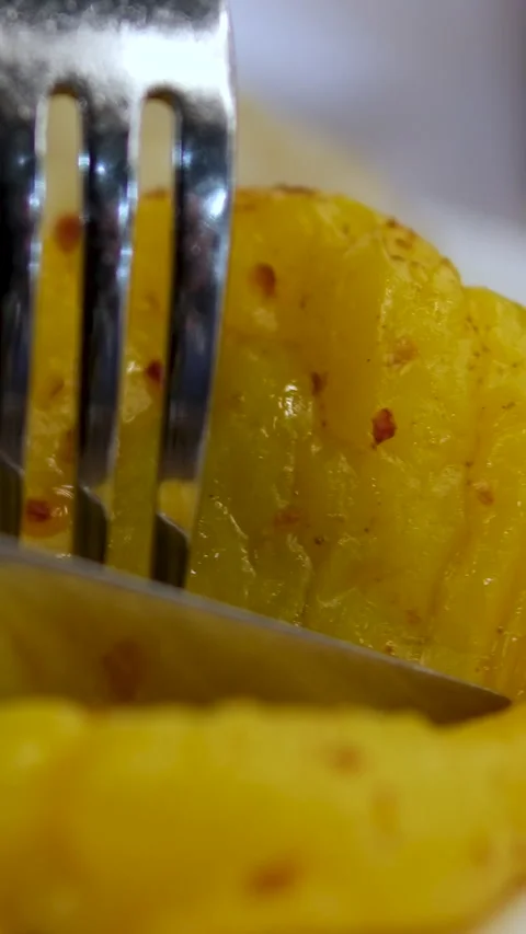 Eat with a fork cut with a knife baked peppers grilled yellow pepper,Vertical Stock Footage 292008092