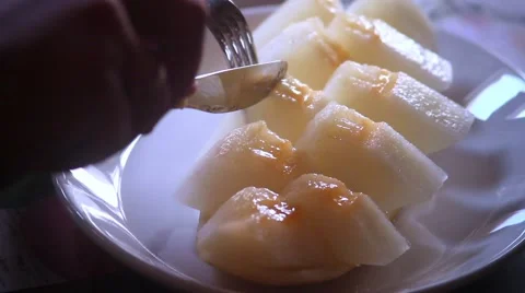 Eat a melon in the restaurant 스톡 동영상 65743020