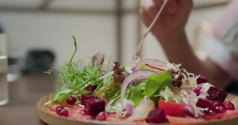 Eat salad in the restaurant Stock Footage 131832857
