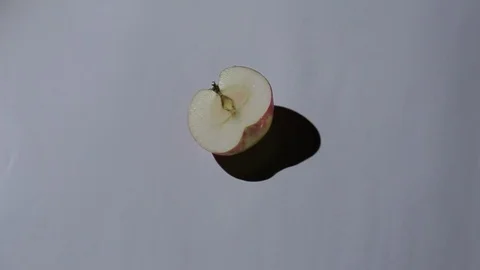 Eating an apple in stop motion. Animation. Stock Footage 76168404