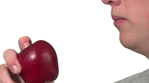 Eating an apple, white background Stock Footage 49862422