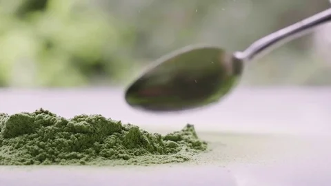 Eating barley grass. Stock Footage 76988405