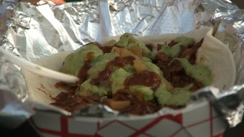 Eating Beef Taco Stock Footage 108398807