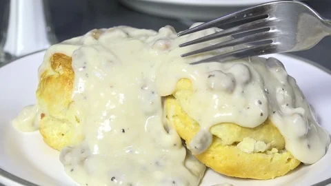 Eating biscuits and gravy closeup Stock Footage 103122236