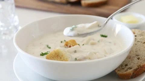 Eating a Bowl of Clam Chowder Stock Footage 149997681