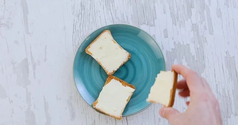 Eating Bread With Cream Cheese 4K Stock Footage 101414910