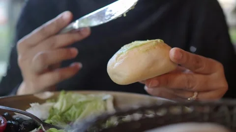 Eating bread with toppings in a restaurant Stock Footage 340598559