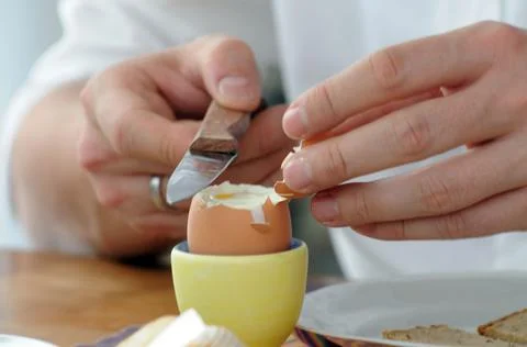 Eating a breakfast egg for breakfast Stock Photos