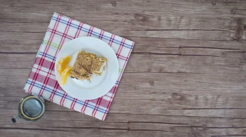 Eating cake and drinking coffee. 4K Time lapse. Top View Stock Footage 63245270