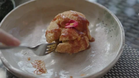Eating cake in cafe close-up slicing piece of tasty cake creamy filling berries Stock Footage 240208596