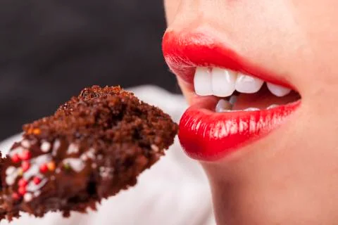 Eating cake close-up Stock Photos