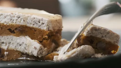 Eating Carrot Cake. Taking bite of healthy vegan cake. Stock-Footage 148693166