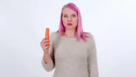 Eating a carrot Stock Footage 83724584