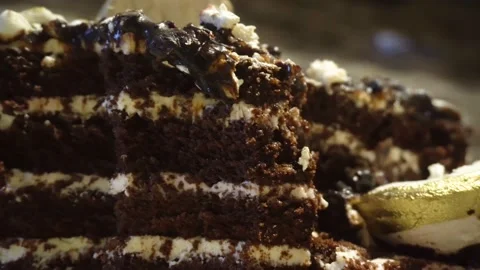 Eating chocolate cake. Taking bite of moist delicious chocolate cake with a fork Video stock 169698986