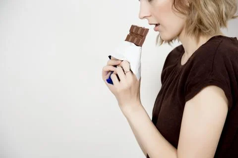 Eating chocolate Stock Photos