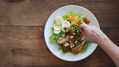 Eating a Cobb Salad Stock Footage 140654690
