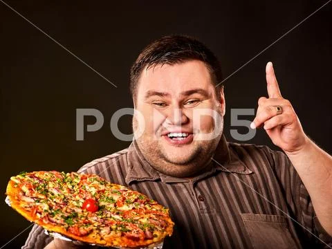Eating contest pizza. Fat man eating fast food for overweight person. Stock Photos