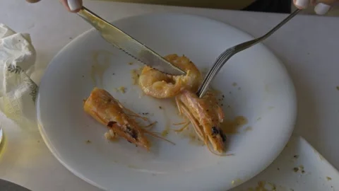 Eating Cooked Shrimp with a Fork on a Plate 스톡 동영상 344372138