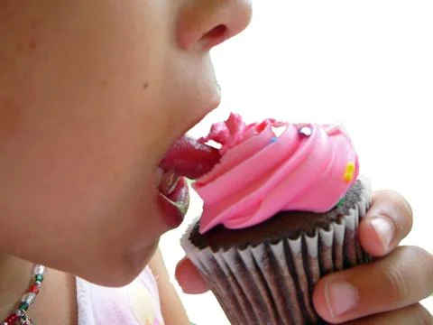 Eating Cupcake Stock Photos