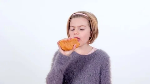 Eating a delicious piece of bread Stock Footage 83724832