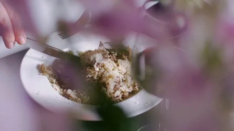 Eating delicious Risotto with veal fillet. Видео 106935022