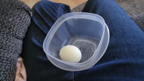 Eating Deviled Egg in Plastic Container 스톡 동영상 220367285