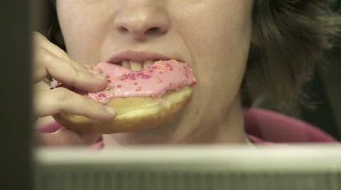 Eating donut  Stock Footage
