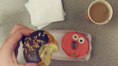 Eating donuts Point Of View POV Stock Footage 48438272