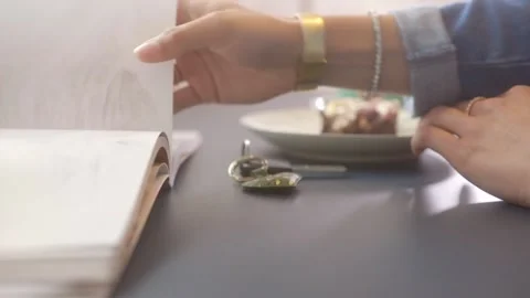 Eating, drinking and reading 스톡 동영상 164381506