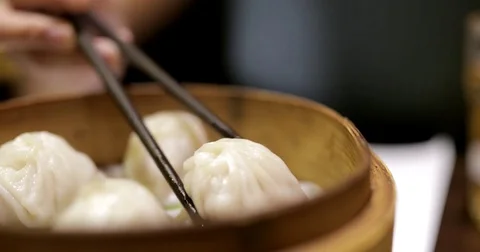 Eating dumpling in chinese restaurant Stock Footage