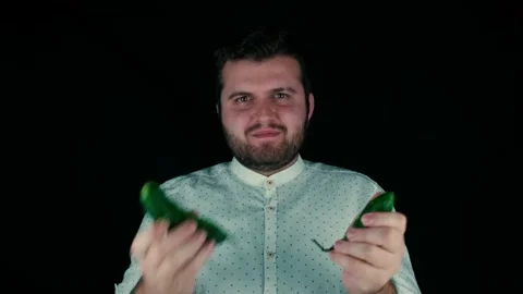 Eating fresh cucumber Stock Footage 169295373