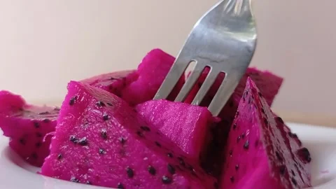 Eating a fresh dragon fruit with the fork Stock Footage 150522874