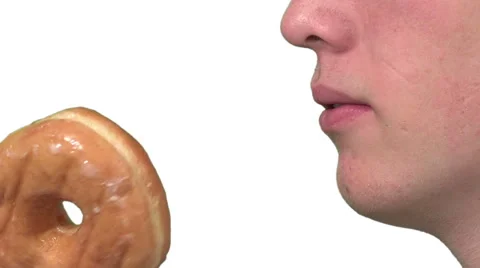 Eating a glaze donut, white background Video stock 49862534