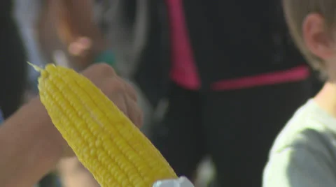 Eating grilled Corn Stock Footage 32880501