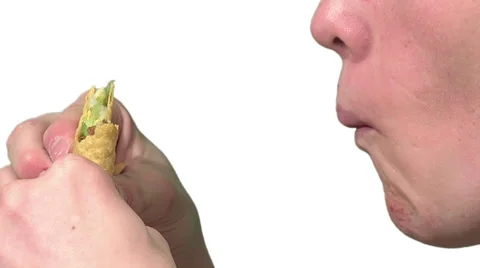 Eating a hard taco, white background Stock Footage 49862734