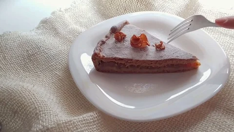 Eating homemade apple pie slice with folk Video stock 103609299