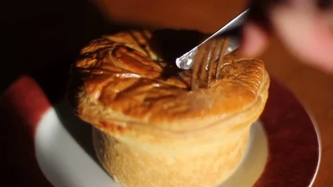 Eating a hot pie Stock Footage 81580933